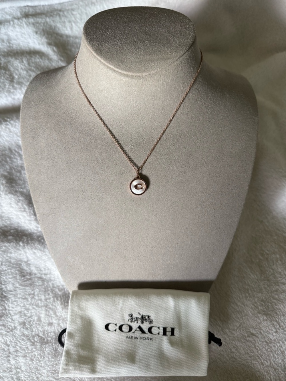 COACH Rose Gold Tone Round Logo Pendant Necklace